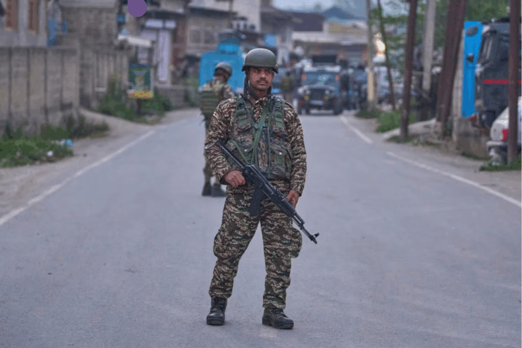 Indian soldier standing with gun in hand