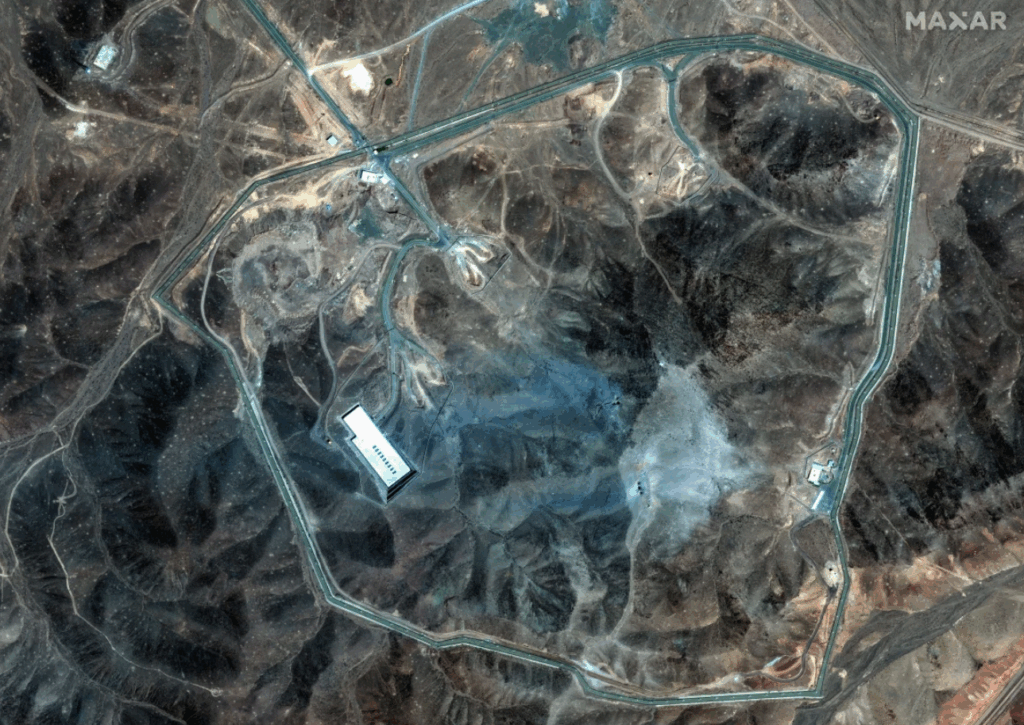 This satellite image shows the Fordow enrichment facility in Iran on Sunday after the US strikes. Editors’ note: The satellite photo above was rotated by Maxar Technologies, the source of the image, to show the original orientation of the moment the image was taken. 
