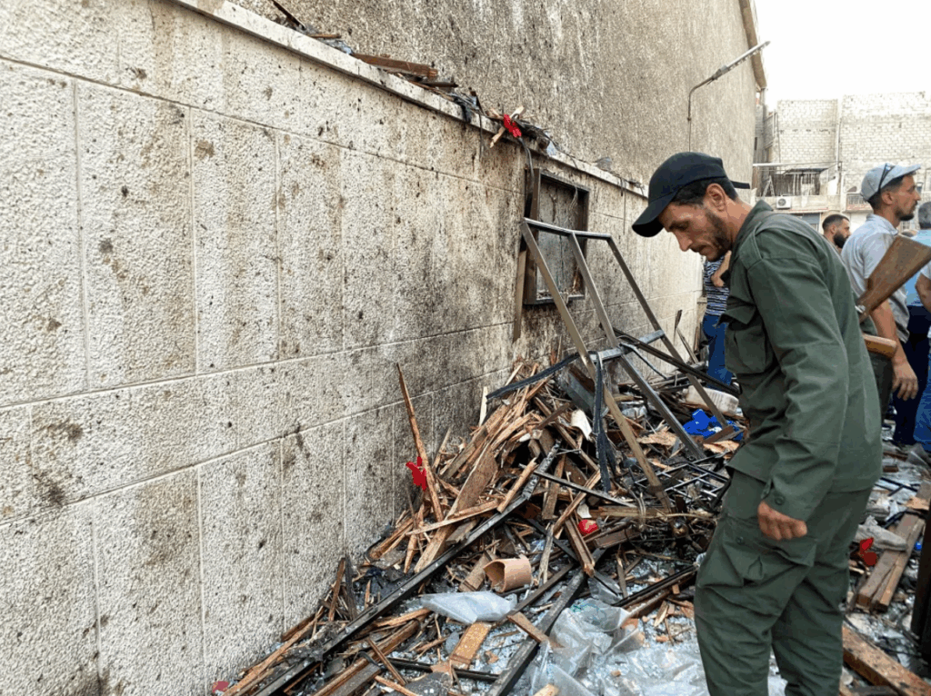 A member of the Syrian security force inspects the damage after a reported attack at the Mar Elias Church in the Dweila neighbourhood of Damascus, Syria on June 22.
