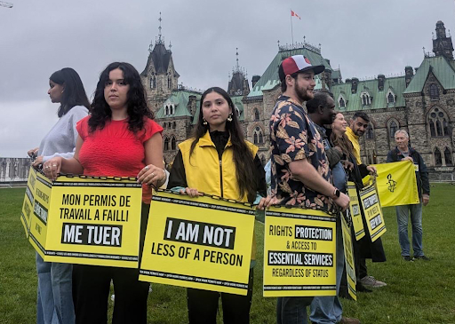 Human rights advocates rally on Parliament Hill in Ottawa to kick off the 2025 National Days of Action for Migrant Workers' Rights. Photo Credit: Amnesty International